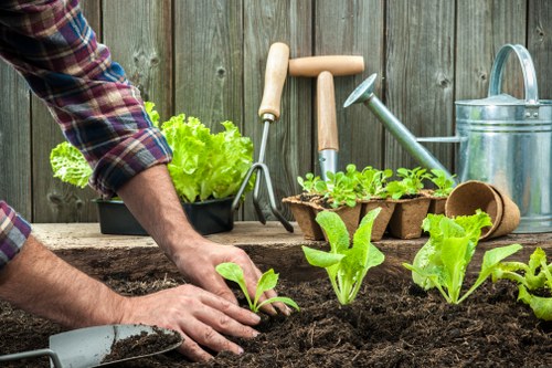 Safety checklist and insurance documents on clipboard at a garden site