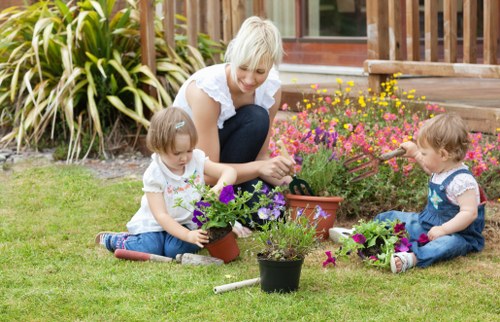 Gardener working on lawn maintenance