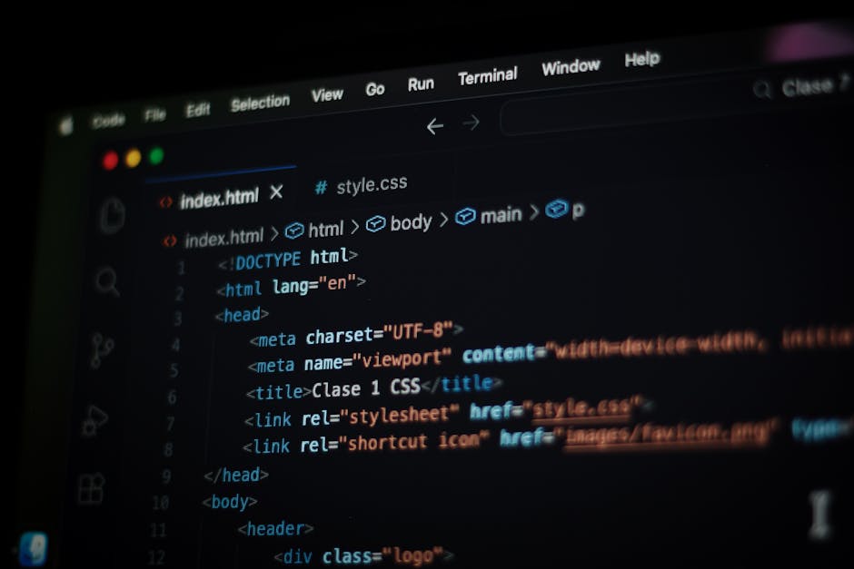 A computer screen displaying HTML code with tags such as <html>, <head>, <title>, and <body>, indicating web development. The code is highlighted with syntax colors: tags in blue, attributes in orange